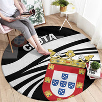 Black round carpet featuring Ceuta text, red-and-blue crest, and diagonal white stripes