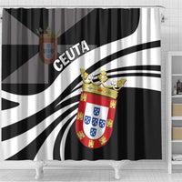 Black and white shower curtain with large central crest shield and curved stripe design