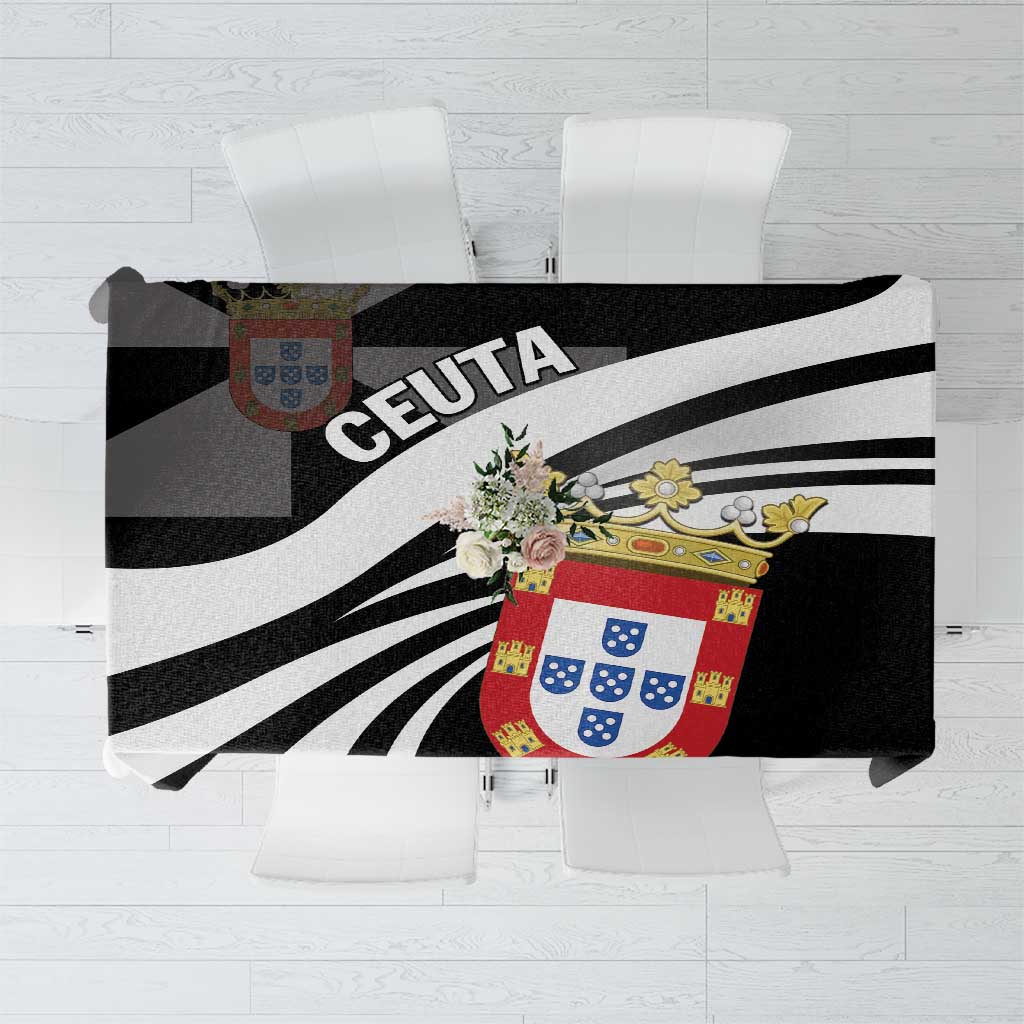 Black tablecloth with bold black-and-white diagonal stripes and colorful crest graphic.