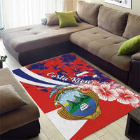 Red area rug with Costa Rica crest, hibiscus flowers, and blue-and-white border