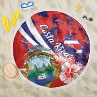Red beach blanket coat with fringed edge, Costa Rica crest, and tropical hibiscus pattern