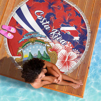 Round beach blanket coat in red, blue, and white with Costa Rica crest and hibiscus
