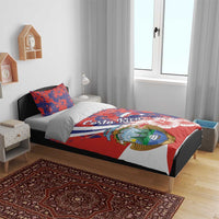 Costa Rica bedding set with red-and-blue hibiscus floral print and coat of arms panel