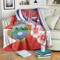 Red and white-blue diagonal stripe blanket with Costa Rica crest and hibiscus floral design