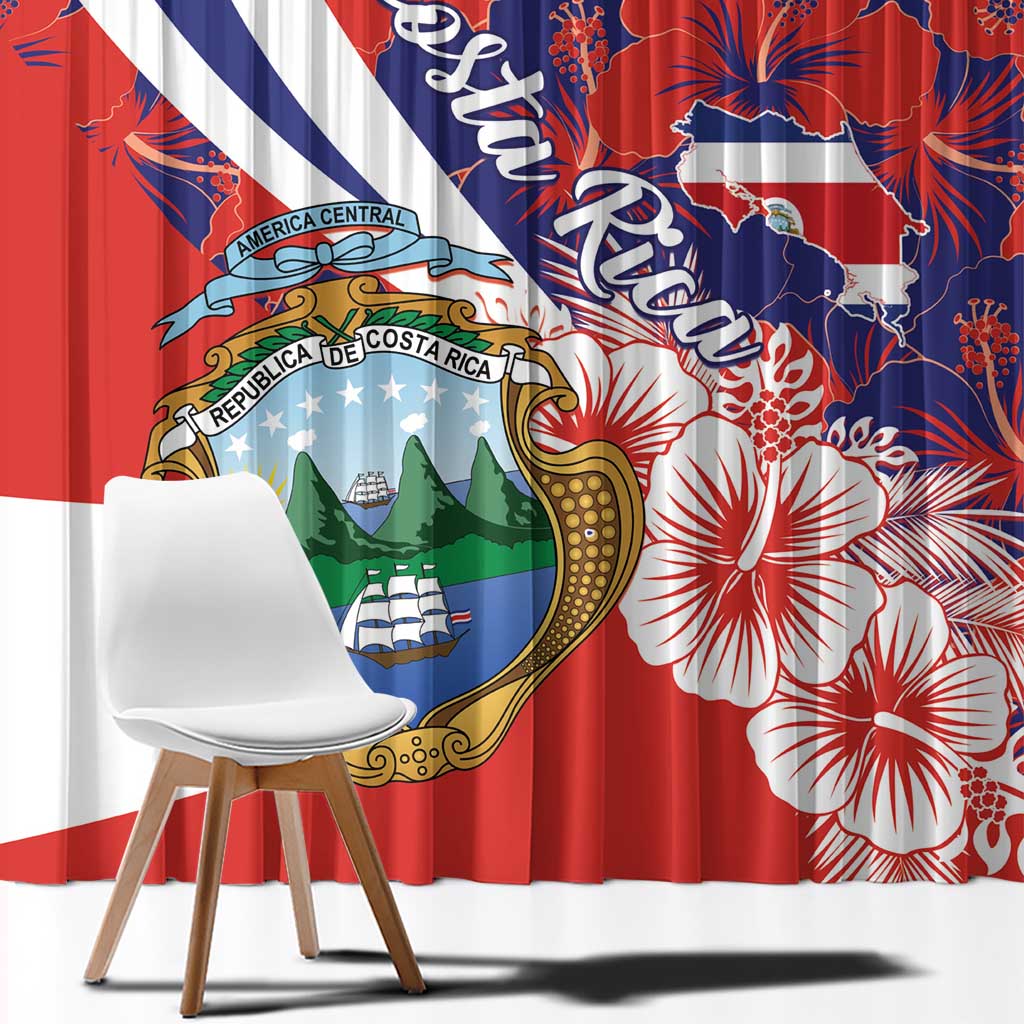 Close-up of red, navy, and white curtain fabric with Costa Rica crest and hibiscus blooms