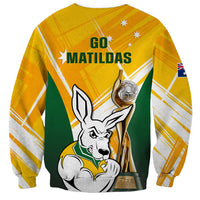 Yellow soccer sweatshirt with kangaroo holding trophy, "Go Matildas" text
