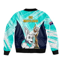 Turquoise soccer bomber jacket back with Go Matildas text, kangaroo and soccer ball, ribbed hem