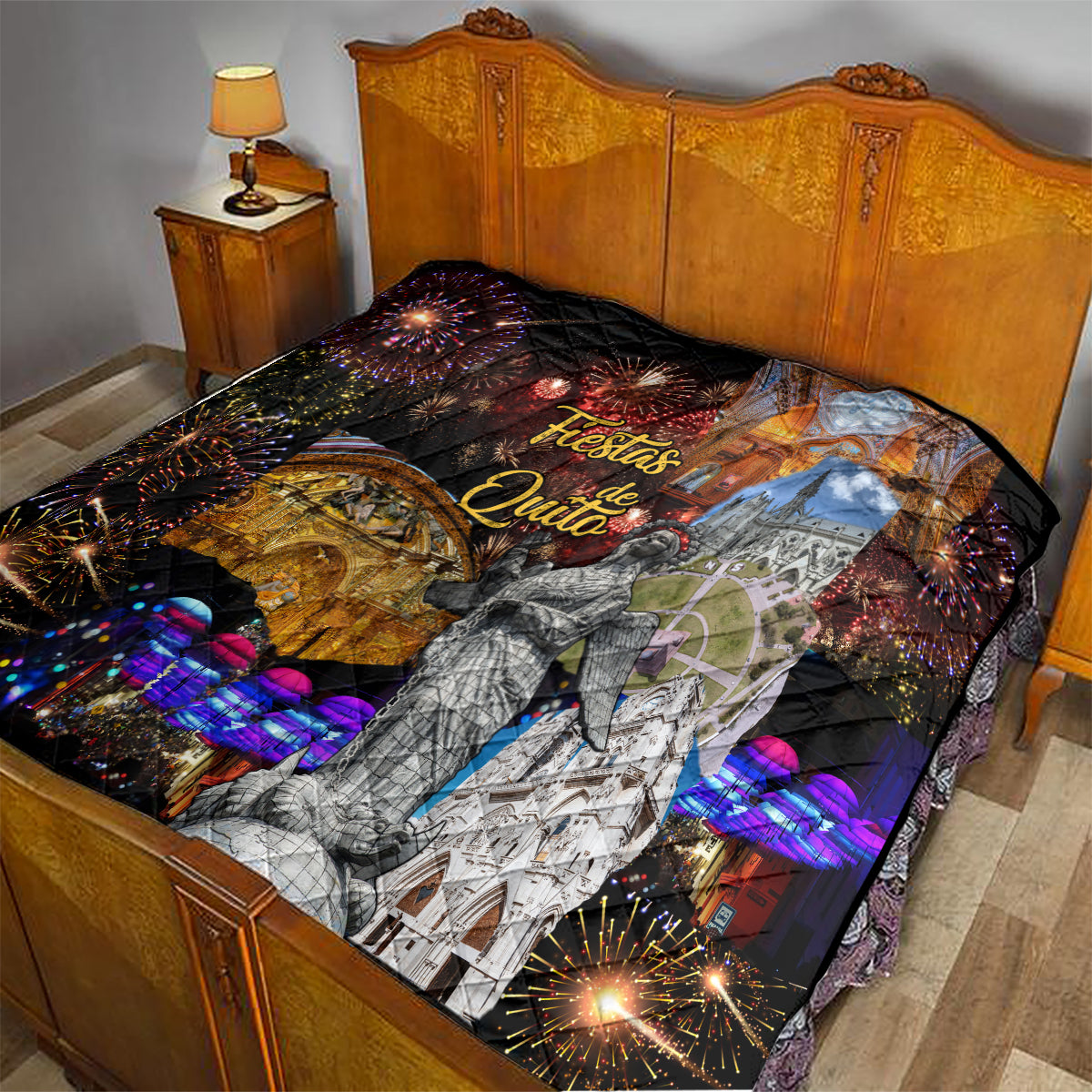 Ecuador quilt on bed, black throw with “Fiestas de Quito,” fireworks, cathedral and dancer