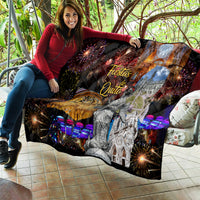 Ecuador quilt held up, black base with “Fiestas de Quito,” fireworks, cathedral and purple lights