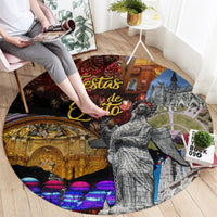 Circular rug with 'Fiestas de Quito' graphic, fireworks and colorful buildings