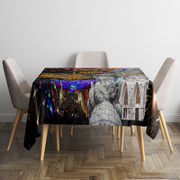 Rectangular tablecloth on dining table with fireworks, purple lights, and grayscale figures
