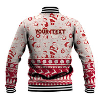 Red-and-white varsity baseball jacket with Santa icons and "YOUR TEXT" on back