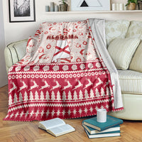 Alabama holiday blanket with Santa and trees pattern; gray underside backing with red trim