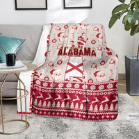 Alabama holiday blanket with Santa, gift icons, and pine tree border in red and white