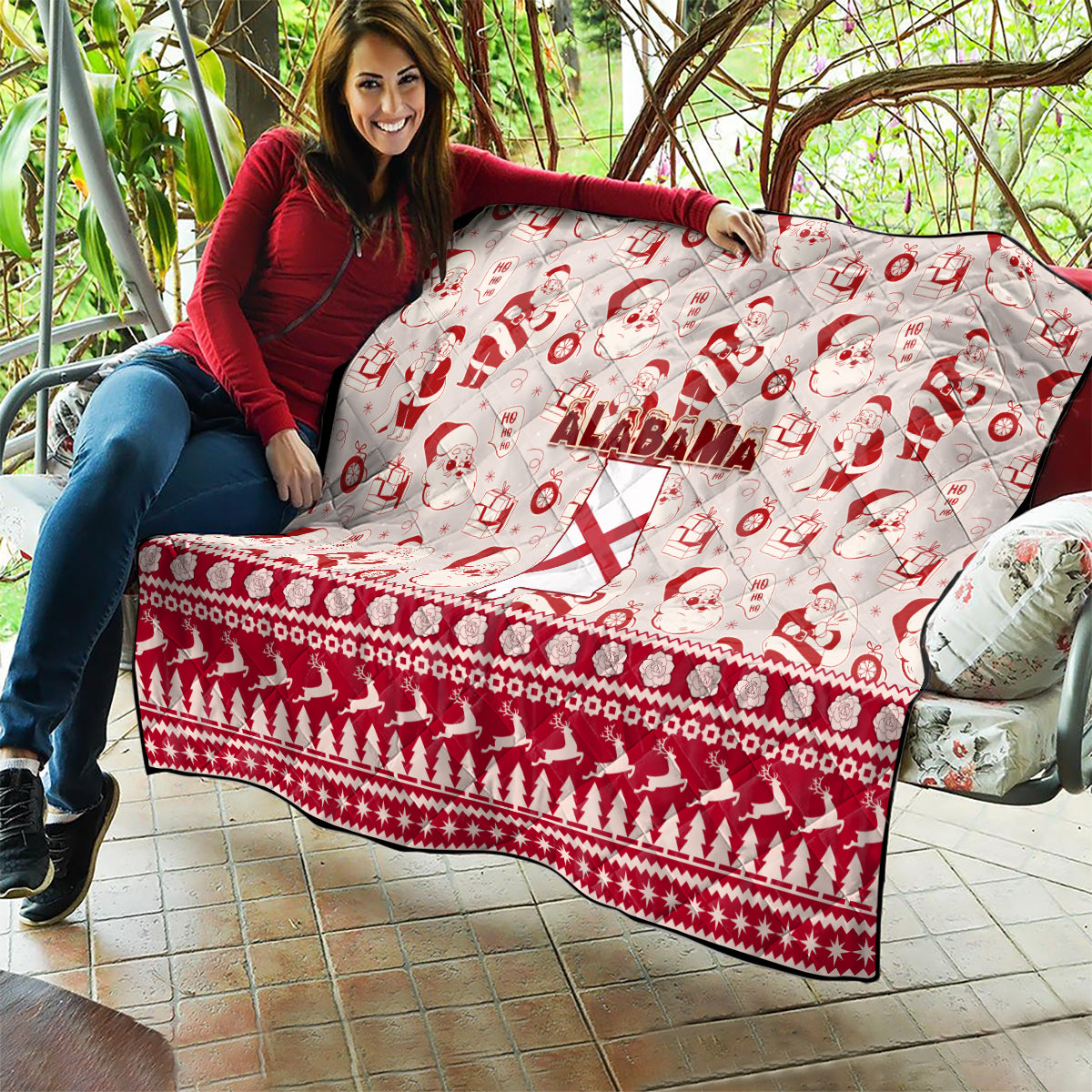 Alabama Christmas quilt draped on a couch, red and white Santa icons and Alabama text