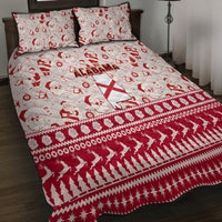 Red and white Alabama holiday quilt bed set with Santa faces and geometric border