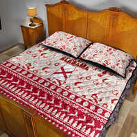 Red and white Alabama quilt bed set with Santa icons, central X logo, matching pillows