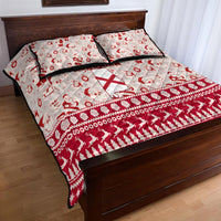 Red and white Alabama holiday quilt bed set with Santa print and bold red geometric trim