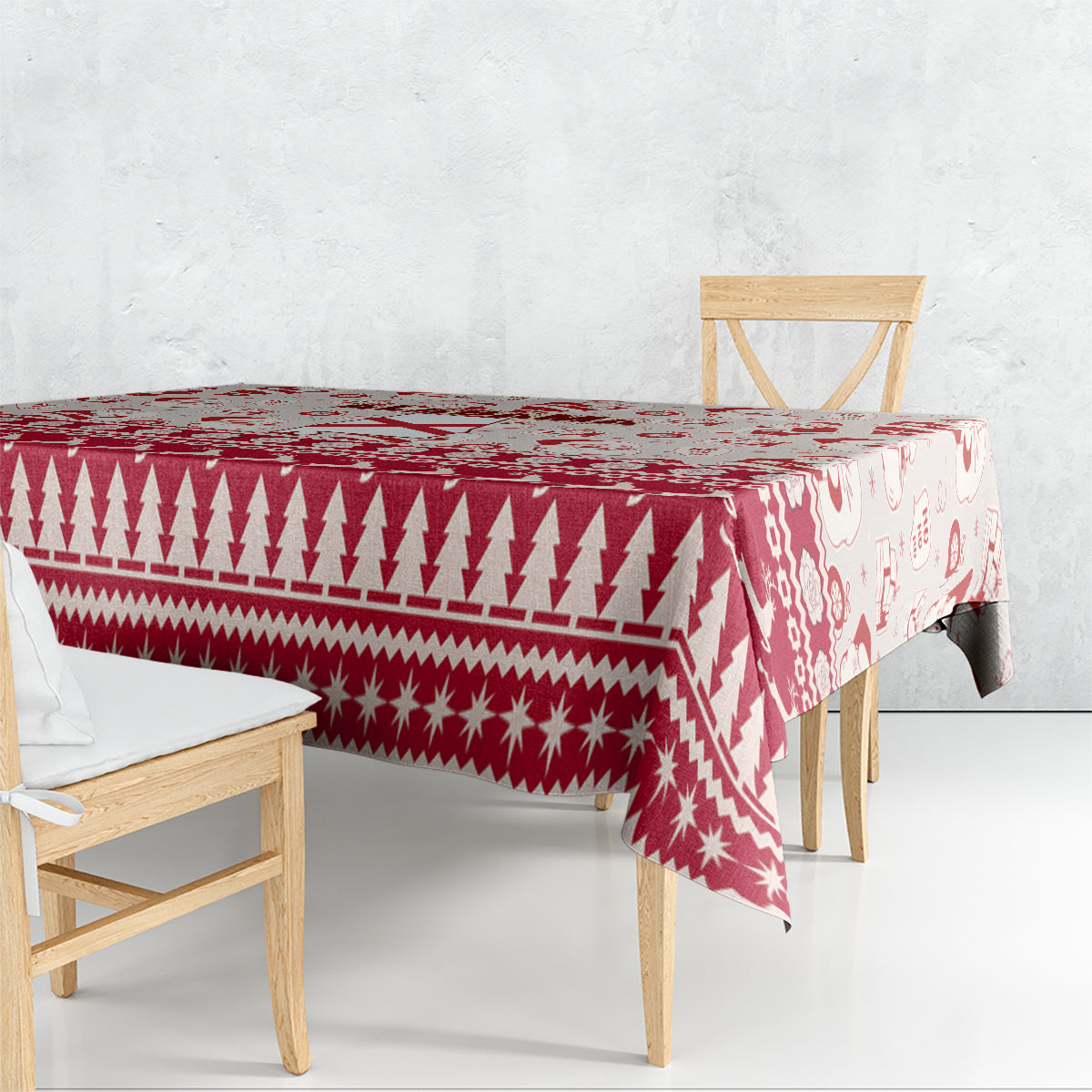 Red holiday tablecloth with geometric triangle and star motifs