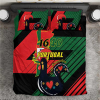 Close-up bedding set with red green black Portugal 1640 crest, bird artwork, and two pillows