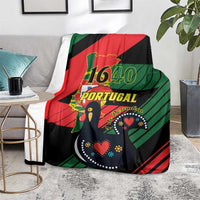 Personalized Portugal flag blanket draped on couch, red green black with 1640 graphic