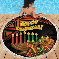 Round fringed Kwanzaa beach blanket showing Happy Kwanzaa and candles in colorful artwork