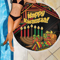 Round Kwanzaa beach blanket with Happy Kwanzaa graphic, colorful candles and fringe edge