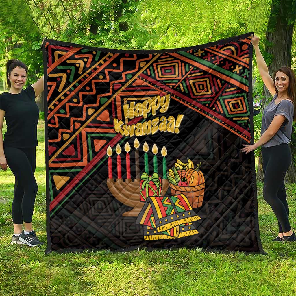 Black quilt with colorful Happy Kwanzaa graphic, candles and African pattern border