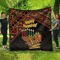 Black quilt with colorful Happy Kwanzaa graphic, candles and African pattern border