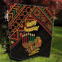 Black Happy Kwanzaa quilt with geometric red, green, and orange design and candles