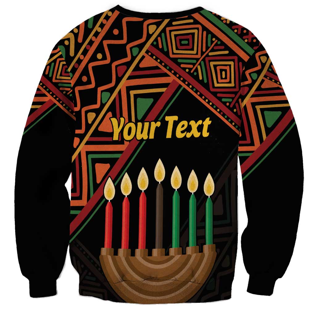Black crewneck sweatshirt with Your Text Kwanzaa graphic and seven candles in patterned art