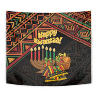 Close-up Kwanzaa tapestry with “Happy Kwanzaa!” lettering, candles, and patterned design