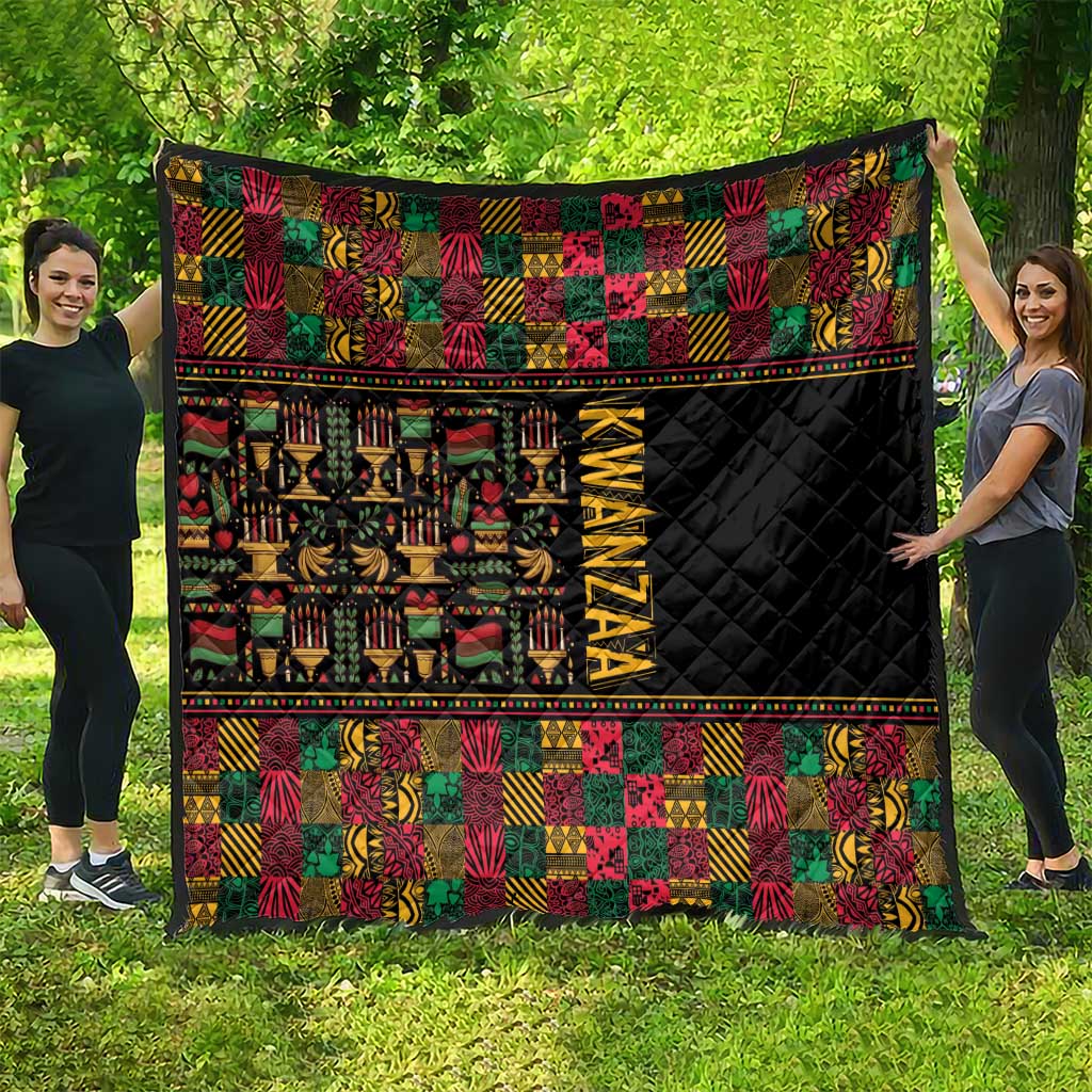 Kwanzaa African pattern quilt showing black quilted side with 'KWANZAA' vertical text