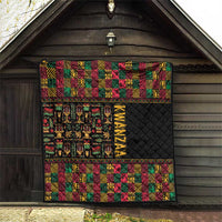 Kwanzaa quilt hanging indoors, black quilted area with multicolor African pattern borders
