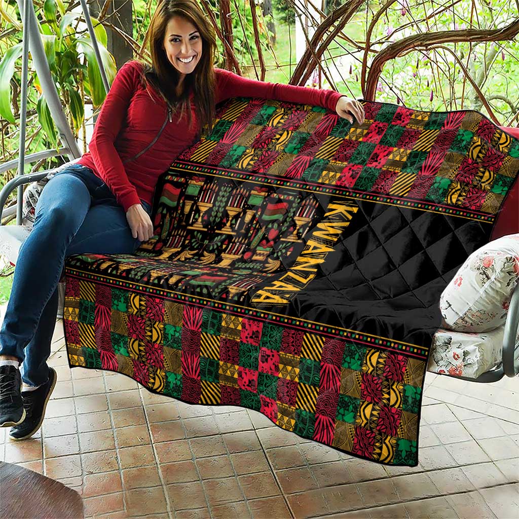 Kwanzaa African pattern quilt with black quilted section and 'KWANZAA' vertical lettering