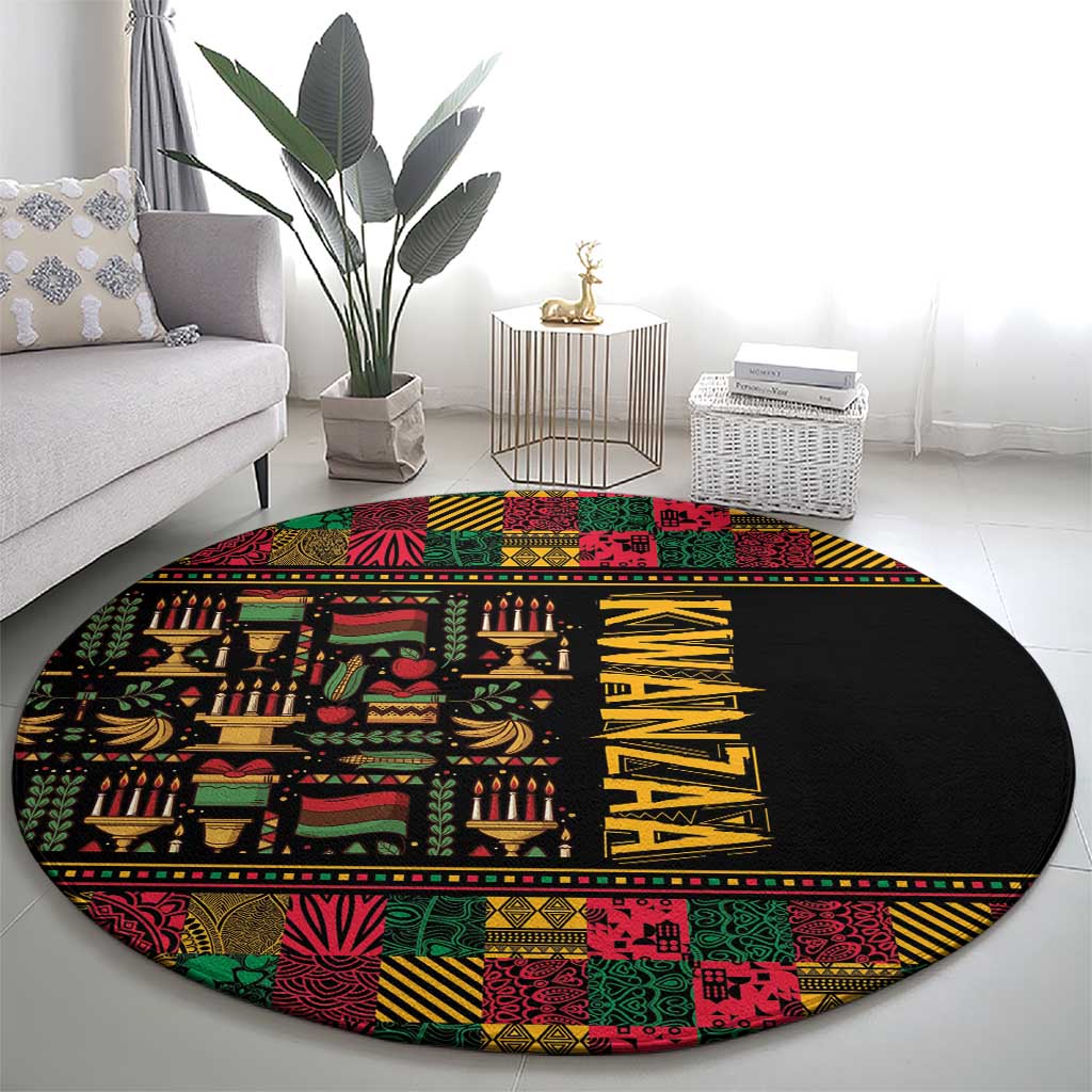 Round black area rug with bold colorful geometric and cultural patterns; yellow vertical lettering