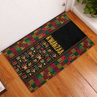 Black rubber doormat featuring 'KWANZAA' in the center with bright geometric border
