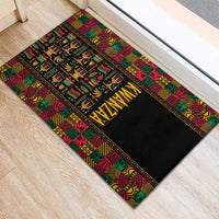 Black doormat with bold 'KWANZAA' lettering and colorful African motif edge border