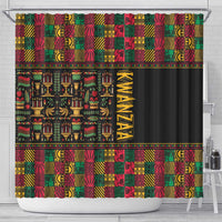 African pattern shower curtain with multicolor grid and candle motif over black panel
