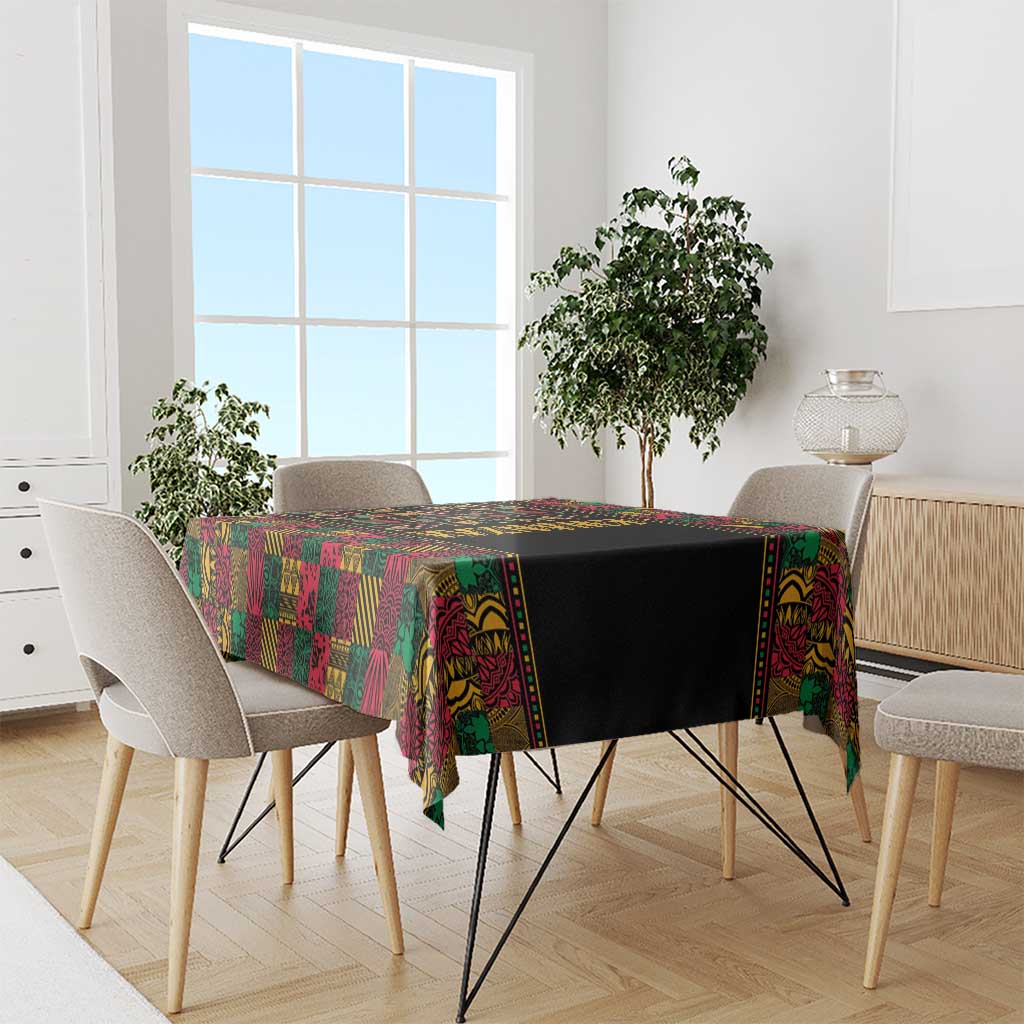 Multicolor African-inspired tablecloth with black base draped over dining table