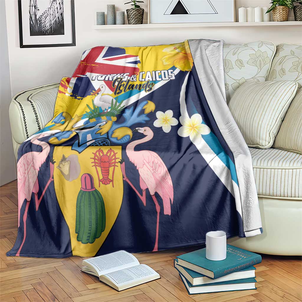 Turks and Caicos throw blanket with coat of arms, flamingos, tropical flowers on blue