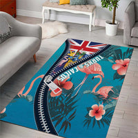 Turquoise area rug with flamingos, tropical flowers, Union Jack, and zipper-style border