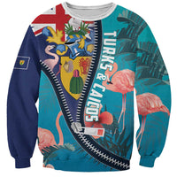 Unisex turquoise zipper sweatshirt with flamingo and island graphic, ribbed crew neck.