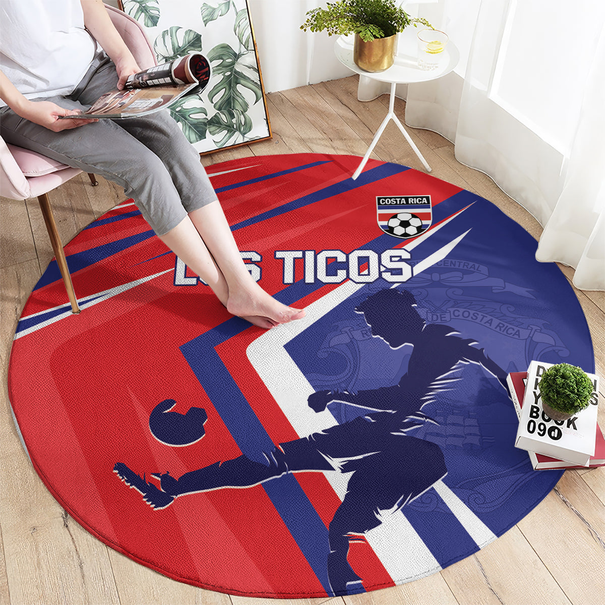 Red round soccer carpet with Costa Rica crest and 'Los Ticos' text, blue map and stripes