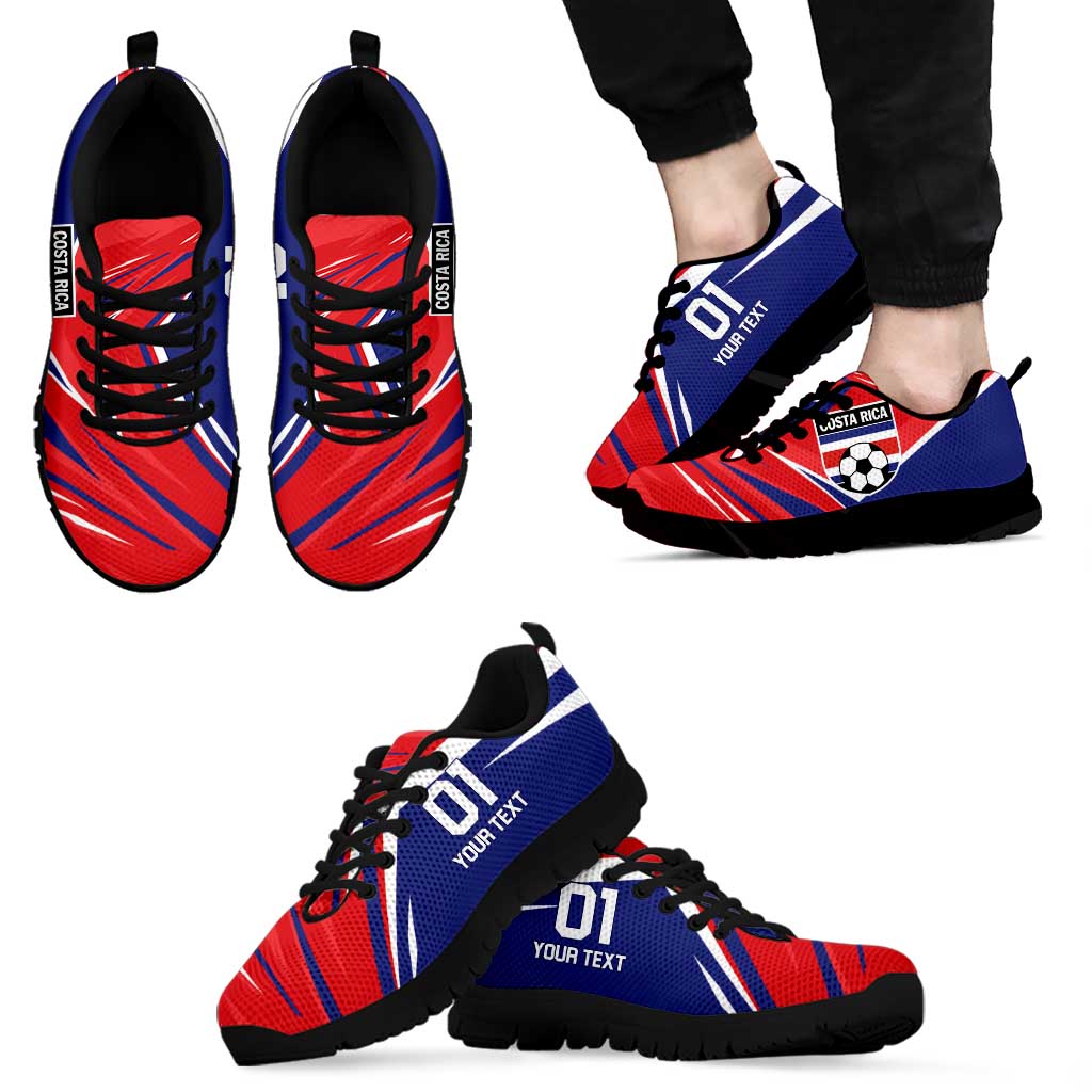 Red and blue soccer sneakers with black laces and black sole, side view
