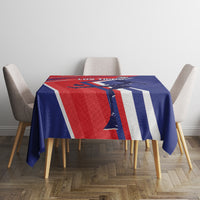 Soccer tablecloth on table with blue, red, and white striped graphic
