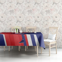 Soccer tablecloth on dining table with blue, red, and white stripes and emblem