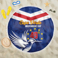Blue round beach blanket with fringed edge and centered Cape Verde Independence Day design