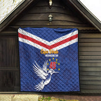 Blue Cape Verde Independence Day quilt displayed on porch wall with diagonal flag stripe