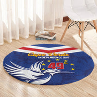 Blue round rug with red-and-white stripe band, Cape Verde Independence Day, 49 and stars